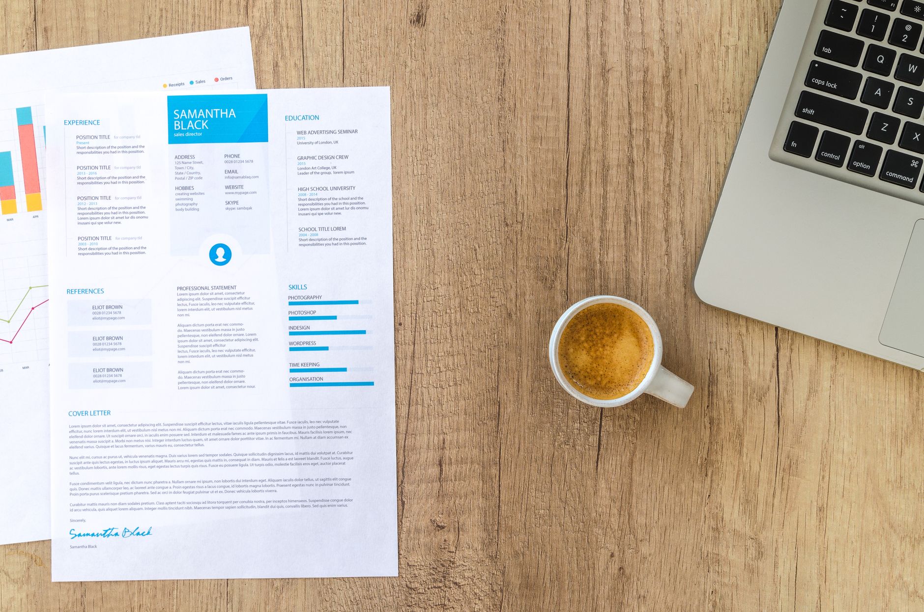 Ilustrasi: Top view of a desk with resume, coffee cup, and laptop on a wooden surface, ideal for business concepts.
