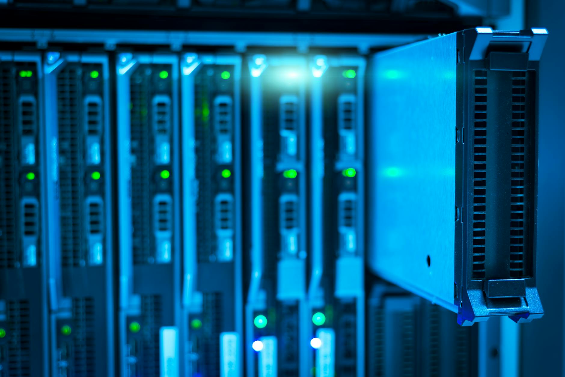 Ilustrasi: Detailed view of a server rack with a focus on technology and data storage.